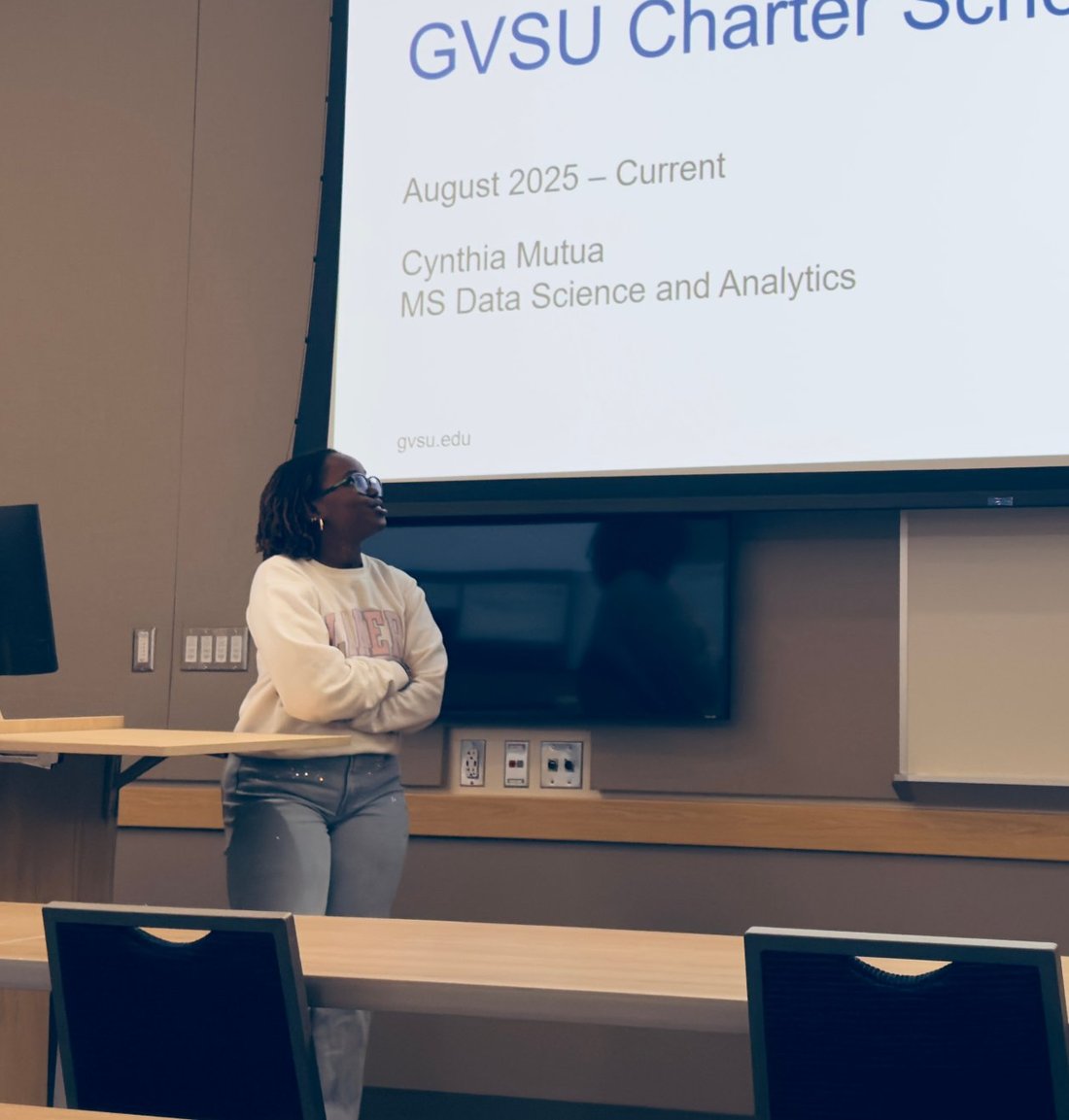 Cynthia Mutua presenting the School Performance Dashboard at the GVSU Charter Schools Office
